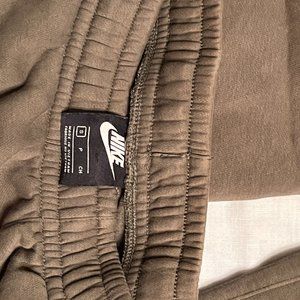 Olive green mens Nike sweatpants, size Small